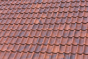 Red tiles roof background