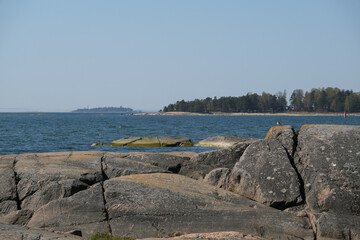 Helsinki archipelago island Pihlajasaaren with woods, trees, rocky sandy beaches and spectacular...