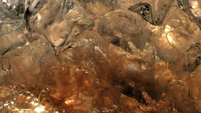 Immersive 4k Slo-motion footage of the summer drink delight. Chilled, fizzy elixir on ice. Tantalising swirls to quench your thirst with this refreshing cola, juice or cider.