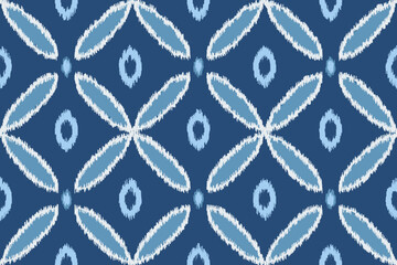 Ikat ogee geometric ethnic seamless pattern. Native American, Indian, African, Mexican, Moroccan, Peruvian. Design for clothing, fabric, wallpaper, textile, texture, home decor, carpet.