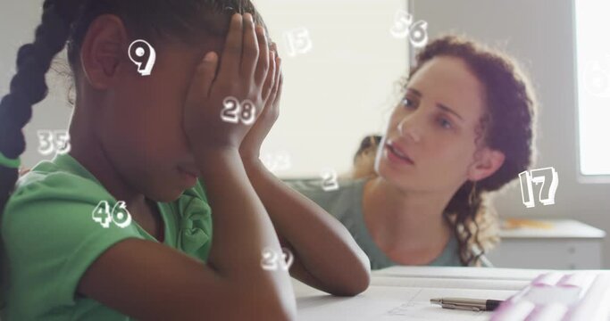 Animation of data processing over diverse female teacher comforting sad schoolgirl in class - Powered by Adobe