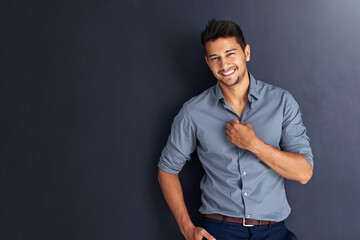 Mockup, portrait and happy business man in studio confident, young and empowered against black...