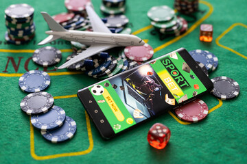 Betting on a smartphone on the background of the casino. Bets, sports betting, bookmaker.