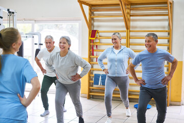 Senior people dancing and working out in fitness class