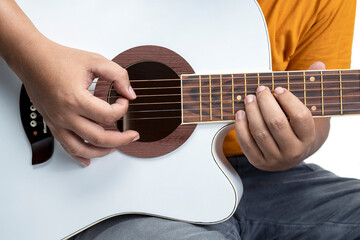 Fototapeta na wymiar Man playing guitar