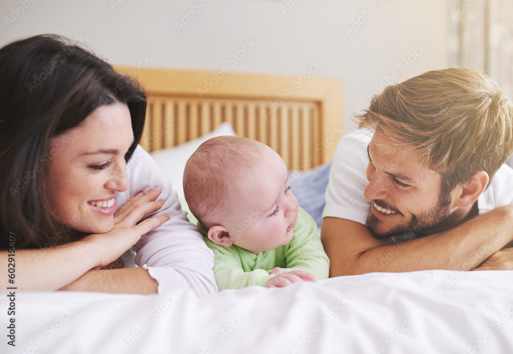 Poster Mother, father and baby relax on bed for love, care and fun quality time together at home. Happy family, parents and newborn bonding in bedroom for support, happiness or nurture childhood development