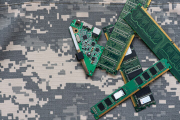 military uniform and microcircuits. green camouflage