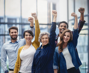 Celebration, diversity and business people with a fist in office for confidence, motivation and...