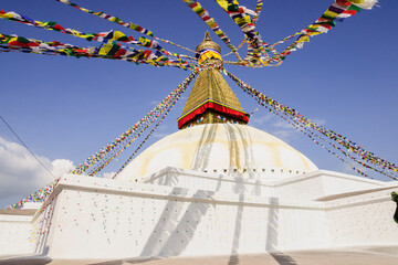 Buddhist stupa with banners,  Boudhdanath, Kathmandu, Nepal, Asia.