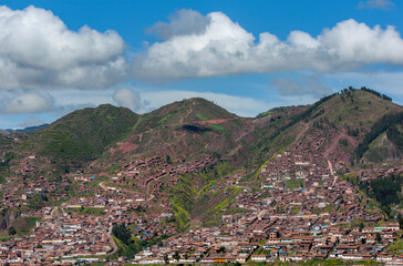 Steep mountains surrounding Cusco in Peru being converted into housing subdivisions.
