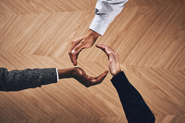 Teamwork, collaboration or hands of business people in circle for motivation, support or recycling in office. Diversity, recycle or top view of employees for goals, community or corporate partnership