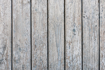 Old wooden background with traces of peeling paint