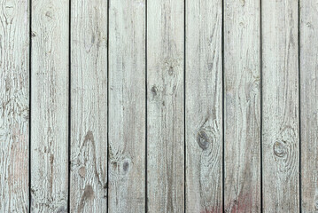 Old wooden background with peeling cracked paint