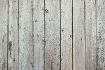 Old wooden background with peeling cracked paint