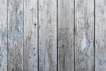 Old wooden background with traces of peeling paint