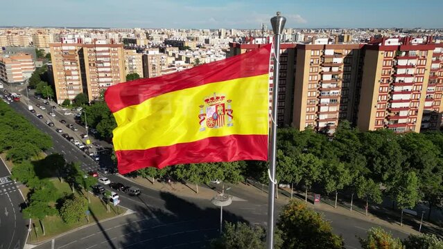 Aerial view of a huge Spanish flag waving in the wind