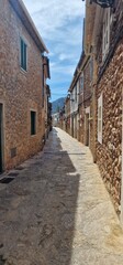 Fototapeta na wymiar Esporles is an ancient land with an open valley and an enterprising, forward-looking town. The municipality stretches across the inner slopes of the Serra de Tramuntana, Mallorca's northern mountain r