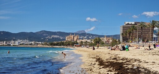 The beach in Palma de Mallorca is a sun-soaked paradise, where golden sands stretch along the...