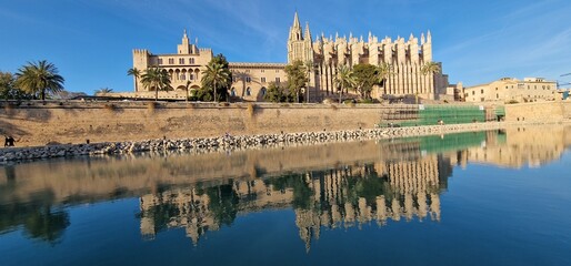 Fototapeta na wymiar Cathedral of Santa Maria of Palma, more commonly referred to as La Seu, is a Gothic Roman Catholic cathedral located in Palma, Mallorca, Spain 