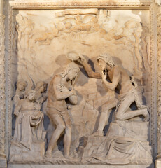 NAPLES, ITALY - APRIL 22, 2023: The relief of Baptism of Jesus in the church Basilica di San Giovanni Maggiore by Giovanni Merliano (cca 1540).