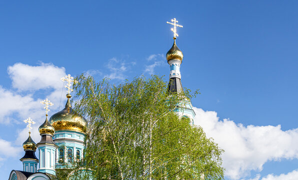 Domes of the Cathedral of St. Tatiana in Cheboksary against the blue sky