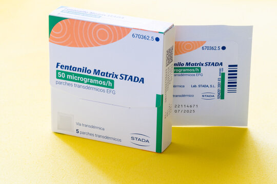 Case with fentanyl transdemic patches, on a yellow background
