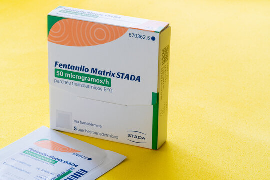 Case with fentanyl transdemic patches, on a yellow background