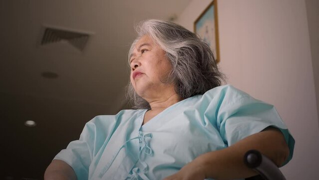 Asian senior adult woman suffering from a mental disorder breakdown sickness, mental disorder concept, negative emotion, Alzheimer, depression and difficult life situation concept