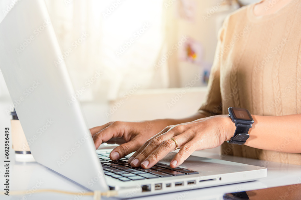 Poster typing keyboard. female person text message for new project she remote work on computer, closeup han