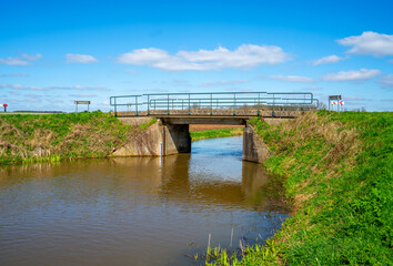 Rural landscape with simple bridge
