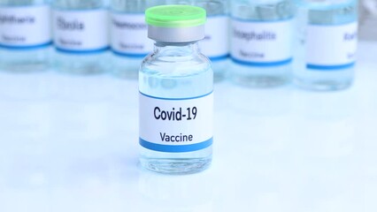 Covid-19 vaccine in a vial, immunization and treatment of infection