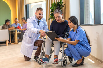 Fototapeta premium Man doctor with stethoscope service help support discussing and consulting care talk to sick senior asian woman patient in hospital,caregiver,elderly,recovery,illness insurance.healthcare and medicine