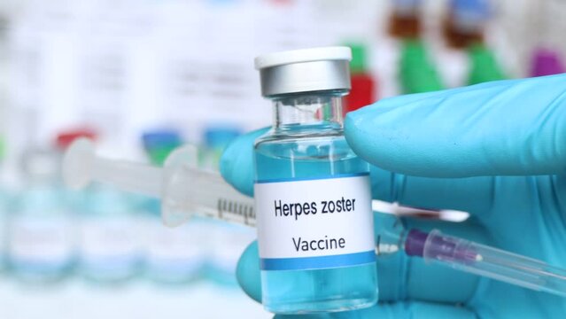 Herpes zoster vaccine in a vial, immunization and treatment of infection