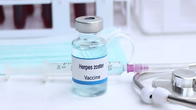 Herpes zoster vaccine in a vial, immunization and treatment of infection
