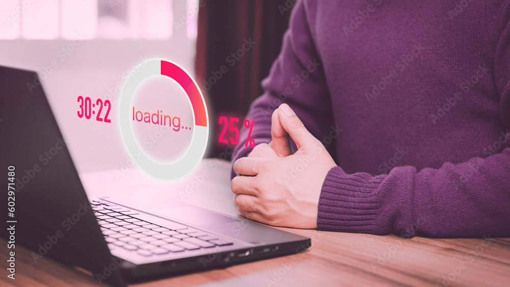 Poster Adult man using a laptop computer for download and update software and waiting to loading digital file data form website, very slow internet form wifi. Concept of waiting for load of loading symbol.