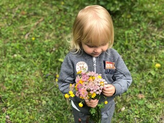 little girl with flowers