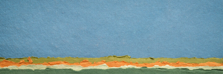 abstract landscape in pastel tones with a blue sky - a collection of handmade rag papers, panorama banner
