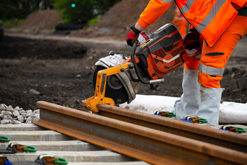 rail track construction, team work on railway