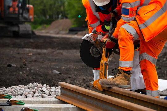 rail track construction, team work on railway