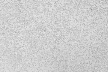Fototapeta na wymiar White-gray uniform background of decorative textured plaster on the wall, grunge background.