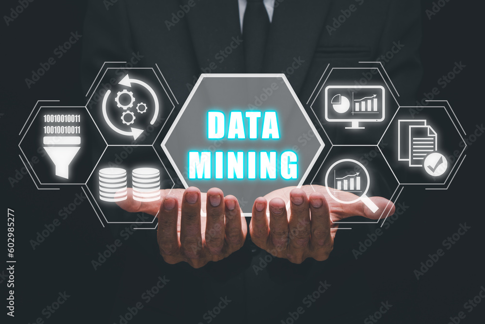 Poster data mining for business and organization, businessman hand holding data mining icon on vr screen, i