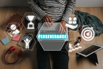 Perseverance concept, Man hand working on laptop computer with perseverance icon on virtual screen.