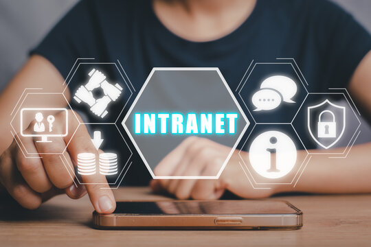 Intranet concept, Person touching on smart phone with intranet icon on virtual screen.
