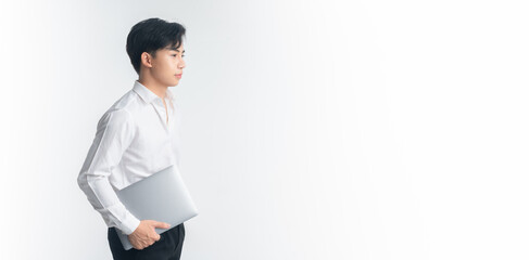Businessman expert.young handsome in a shirt holding laptop and smiling while standing against white background