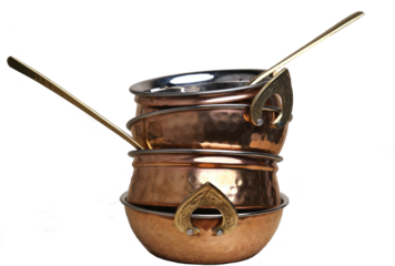 copper and stainless serving dishes (indian handi, karahi pots for food) cooking utensils made of hammered brass isolated on white background (spoon, bowl with handles) stacked