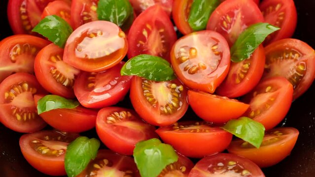 Healthy vegan salad. Fresh salad tomatoes, olive oil and basil