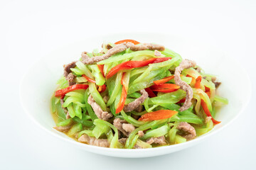 Fried meat with shredded lettuce on a plate on a white background