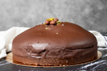 Chocolate cake. Homemade cake with cream inside and outside covered with chocolate. Close up