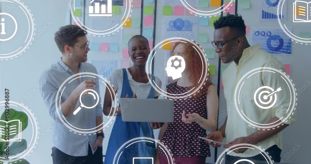 Poster animation of multiple digital icons against diverse team of collegues smiling together at office