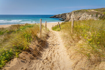Fototapeta na wymiar Sandy path to the beach on the West coast of Quiberon peninsula, Morbihan, Brittany, France